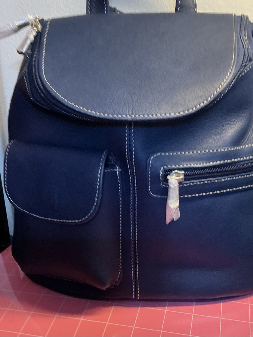 Navy blue leather backpack
